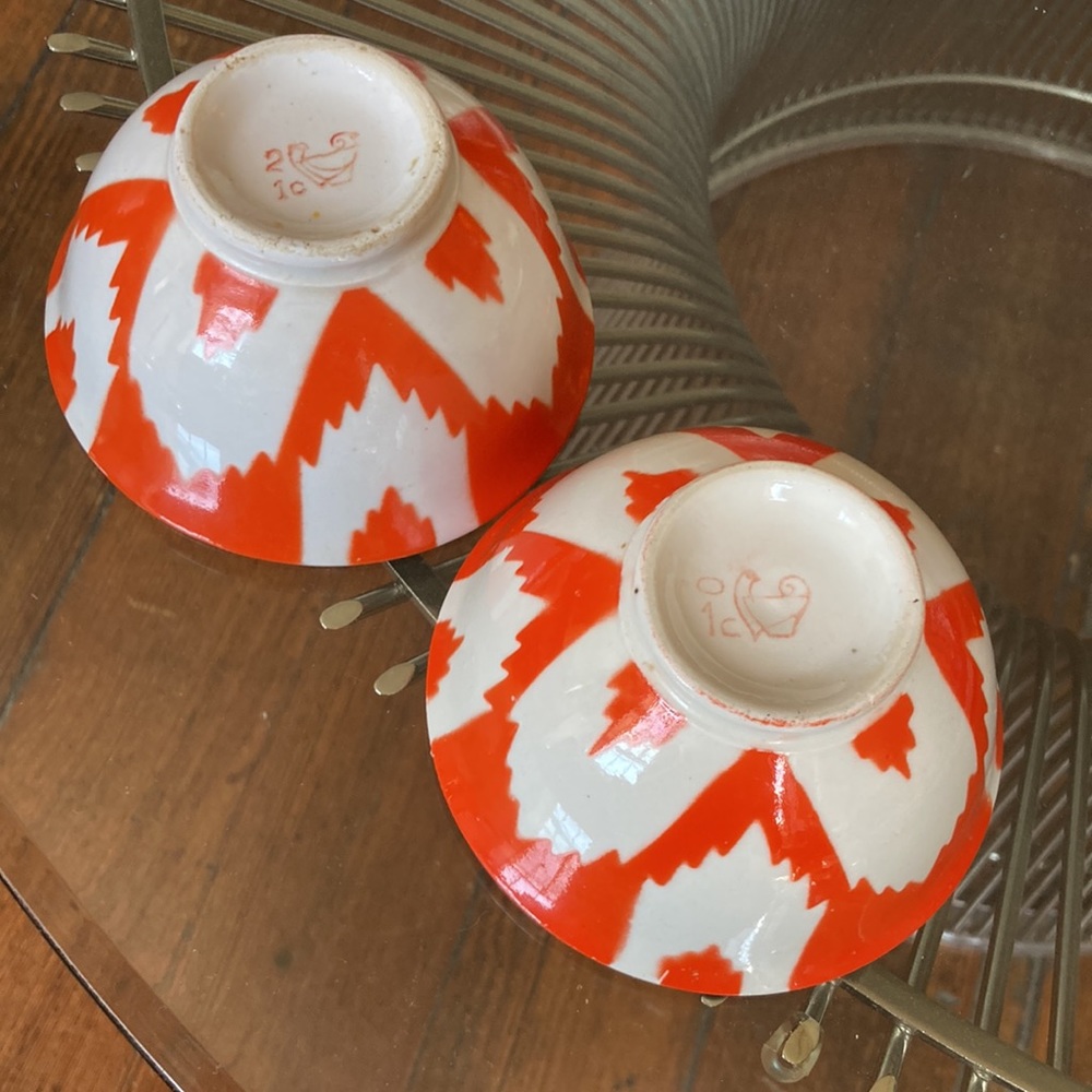 Set of two handmade vintage porcelain ceramic orange ikat bowls